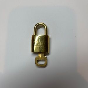 Louis Vuitton Lock and key.